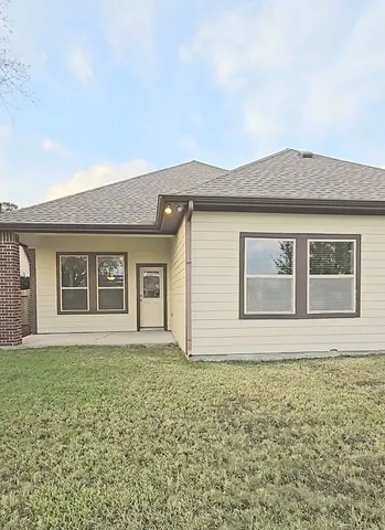 a view of open space with a building in the background