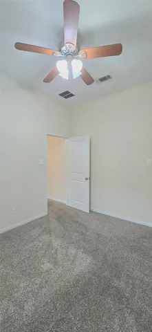 a bathroom with a sink a toilet a mirror and bathtub