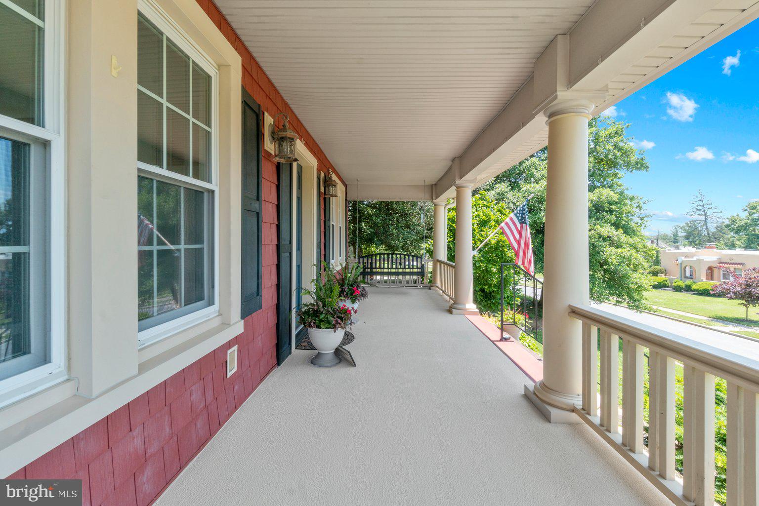 4302 Kensington Road Baltimore, MD 21229 - Photo 54 of 54 front porch with swing