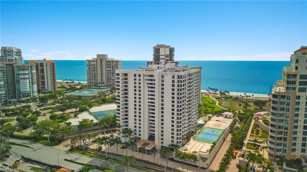 4451 Gulf Shore Boulevard North, Unit 2002 Naples, FL 34103 - Photo 1 of 42 a view of a city with tall buildings