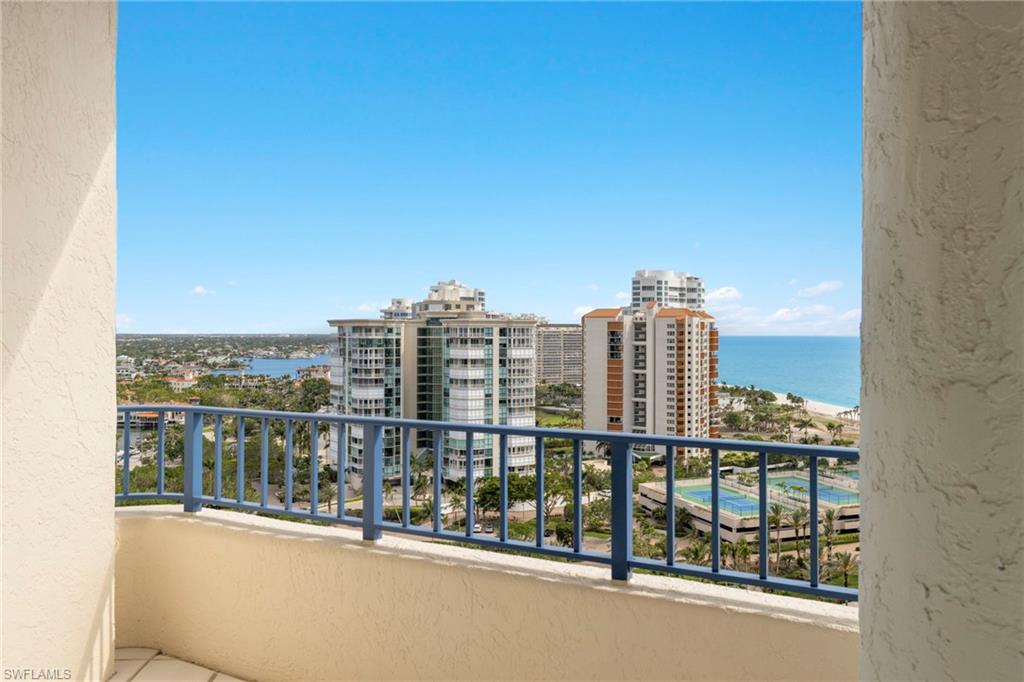 4451 Gulf Shore Boulevard North, Unit 2002 Naples, FL 34103 - Photo 21 of 42 a view of a balcony with city view
