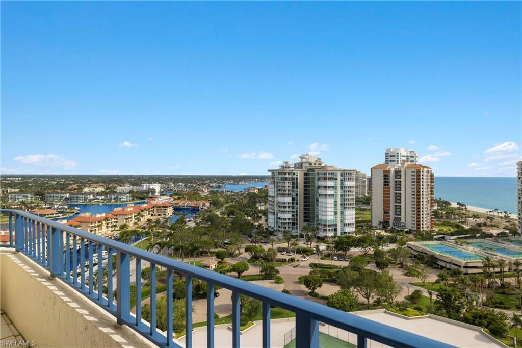 4451 Gulf Shore Boulevard North, Unit 2002 Naples, FL 34103 - Photo 23 of 42 a view of a city from a balcony