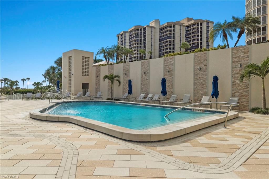 4451 Gulf Shore Boulevard North, Unit 2002 Naples, FL 34103 - Photo 31 of 42 a view of a building with a outdoor space
