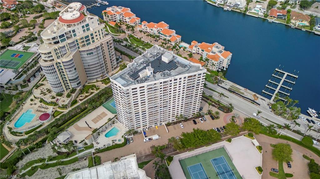 4451 Gulf Shore Boulevard North, Unit 2002 Naples, FL 34103 - Photo 39 of 42 view of a house with a flower garden