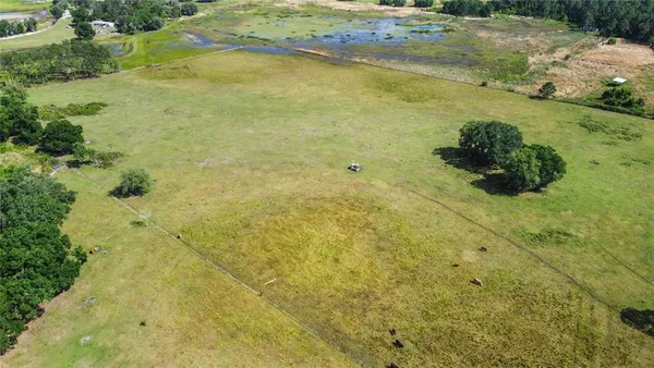 a view of a lake with a houses