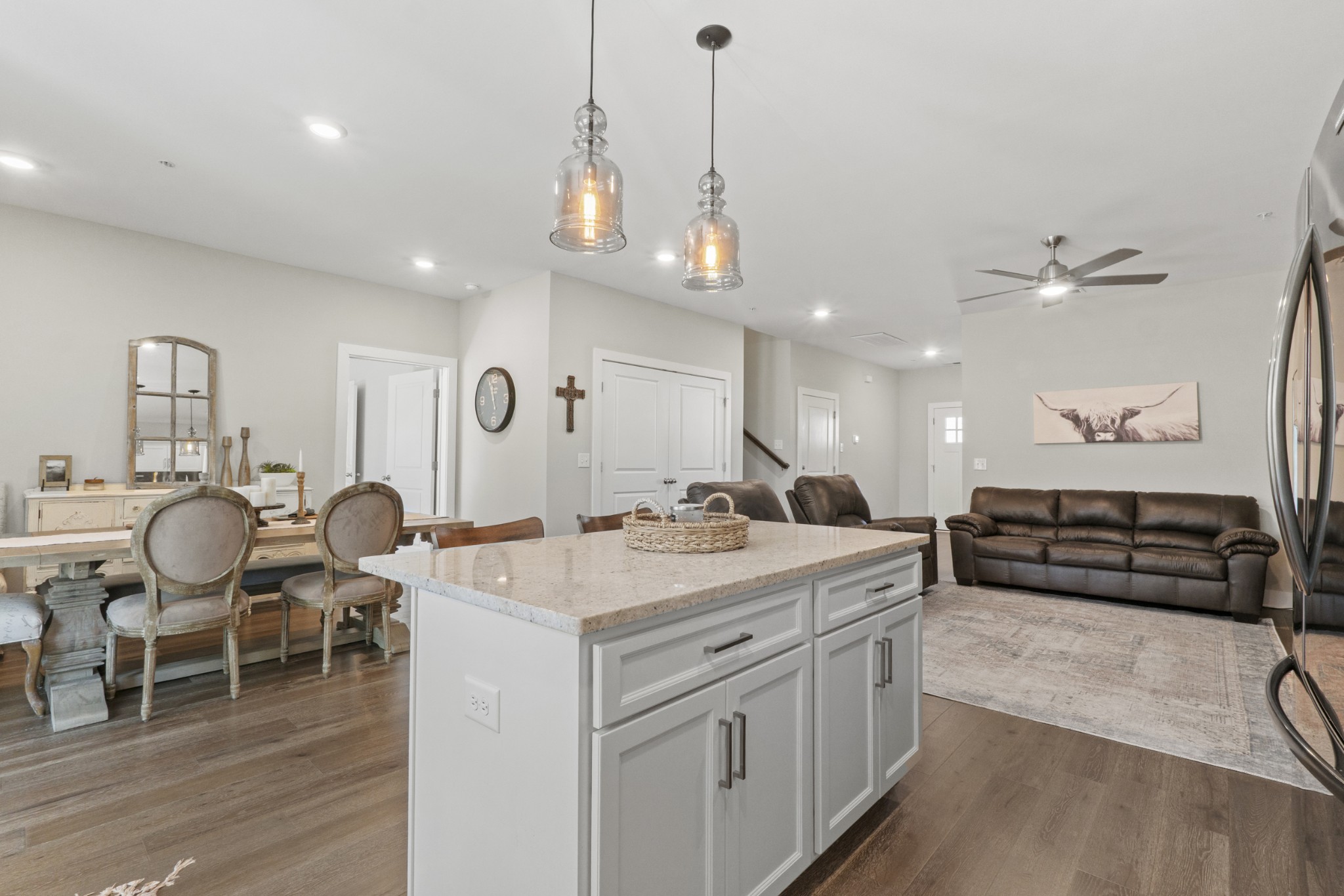 1144 Lock 4 Road, Unit J4 Gallatin, TN 37066 - Photo 13 of 50 a large kitchen with a table chairs and white cabinets