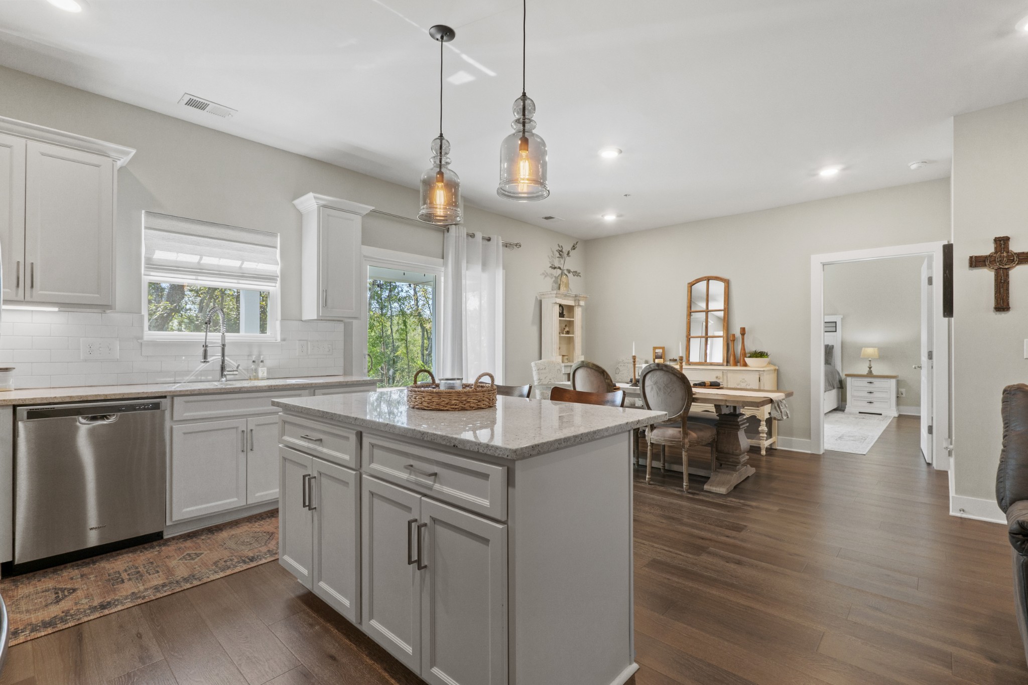 1144 Lock 4 Road, Unit J4 Gallatin, TN 37066 - Photo 14 of 50 a open kitchen with center island white cabinets and stainless steel appliances