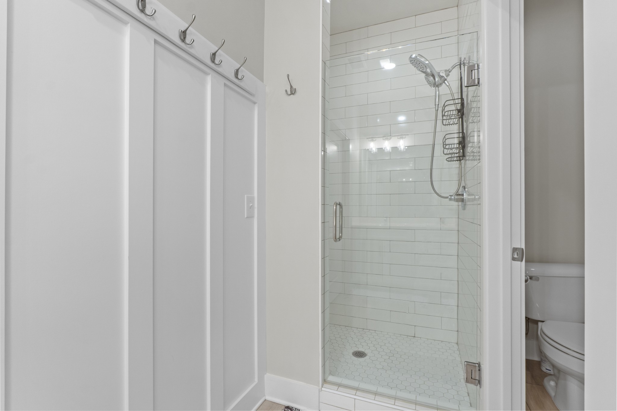1144 Lock 4 Road, Unit J4 Gallatin, TN 37066 - Photo 23 of 50 a bathroom with a glass shower door