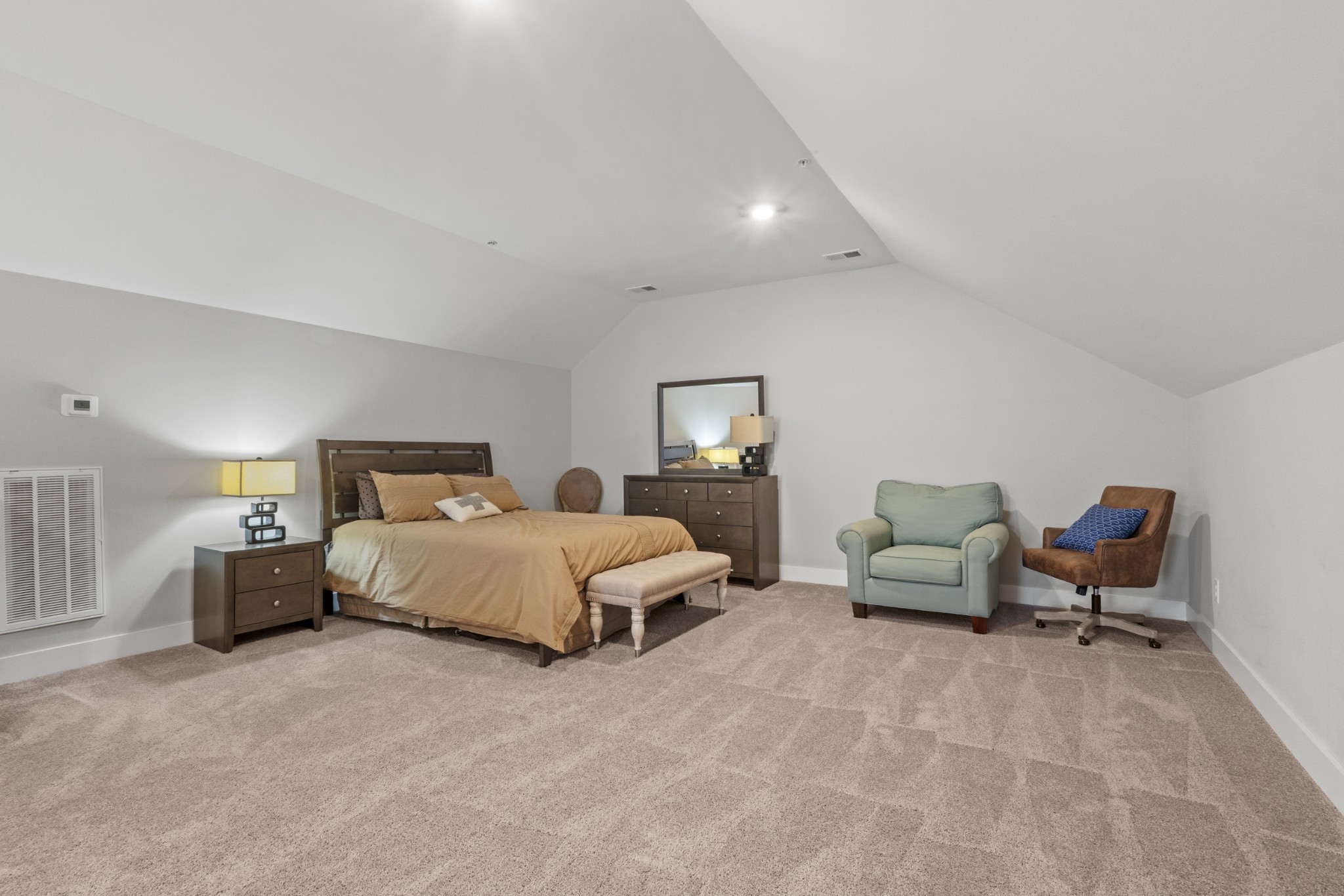 1144 Lock 4 Road, Unit J4 Gallatin, TN 37066 - Photo 30 of 50 a spacious bedroom with a bed and lamp