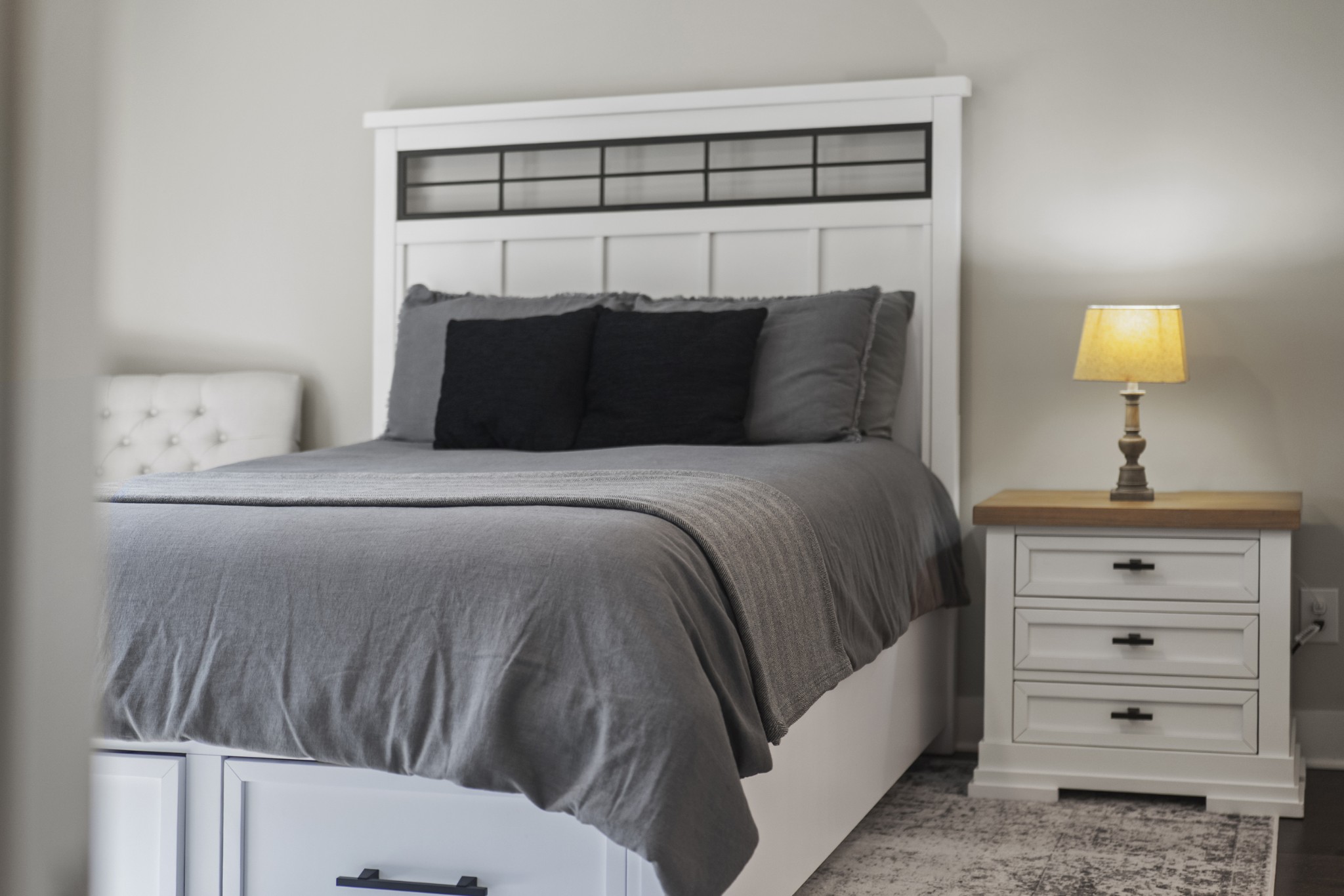 1144 Lock 4 Road, Unit J4 Gallatin, TN 37066 - Photo 37 of 50 a bedroom with a bed and a night stand