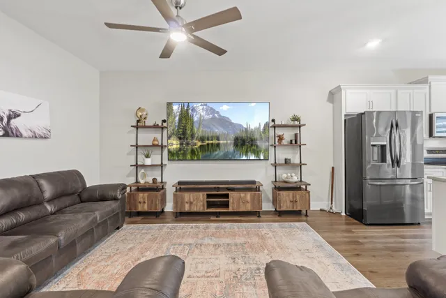 a living room with furniture and a fireplace