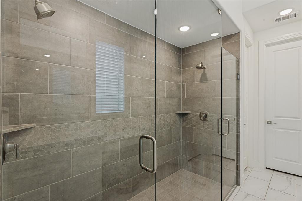 14937 Nightmist Road Aledo, TX 76008 - Photo 17 of 25 You will love the large walk in shower in the primary bath. It has two shower heads and an entrance on each side