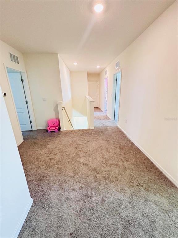 5185 Barombi Bend St. Cloud, FL 34772 - Photo 20 of 47 a view of a room with air conditioner duct and window