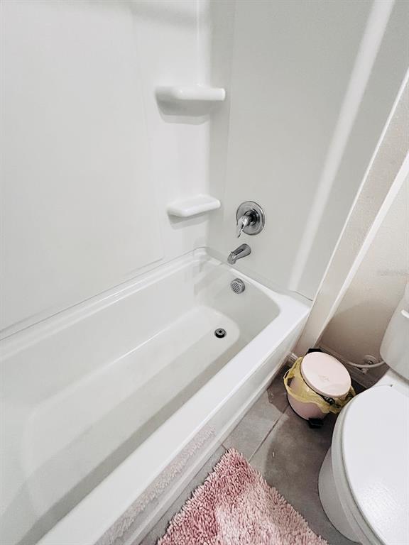 5185 Barombi Bend St. Cloud, FL 34772 - Photo 35 of 47 a bathroom with a sink and a toilet