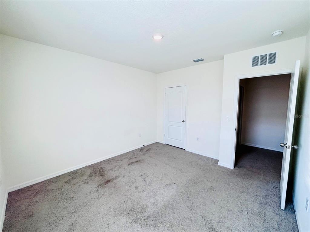 5185 Barombi Bend St. Cloud, FL 34772 - Photo 38 of 47 a view of an empty room