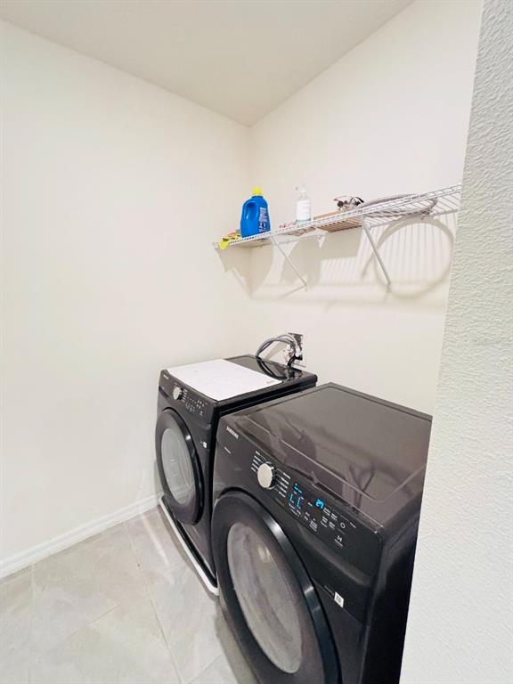 5185 Barombi Bend St. Cloud, FL 34772 - Photo 40 of 47 a utility room with dryer and washer