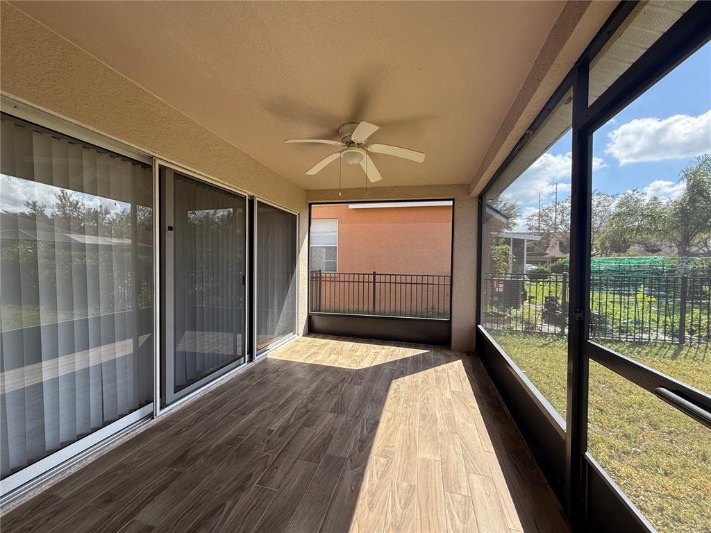 6518 Bridgecrest Drive Lithia, FL 33547 - Photo 14 of 26 wooden floor in an empty room with a window