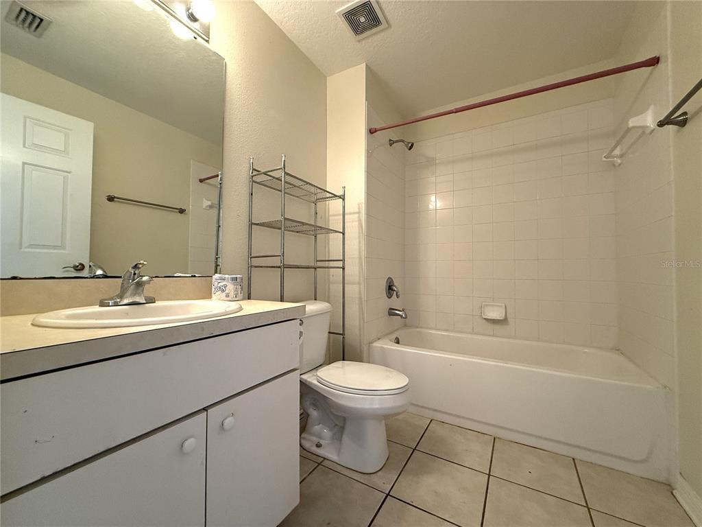 6518 Bridgecrest Drive Lithia, FL 33547 - Photo 17 of 26 a bathroom with a sink toilet and shower