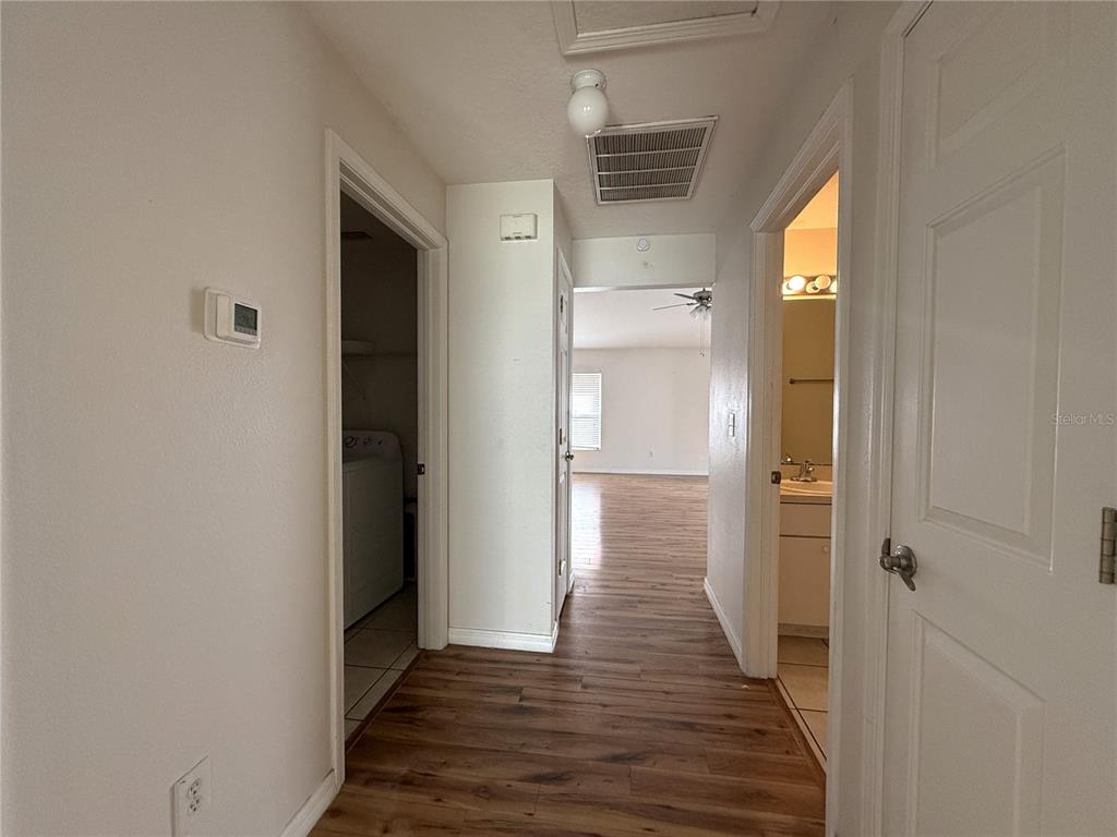 6518 Bridgecrest Drive Lithia, FL 33547 - Photo 20 of 26 a view of hallway with wooden floor