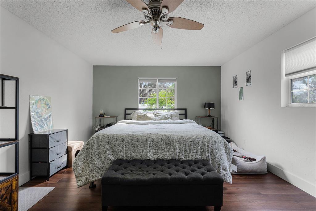 2935 Aein Road Orlando, FL 32817 - Photo 11 of 27 a bedroom with a bed and window