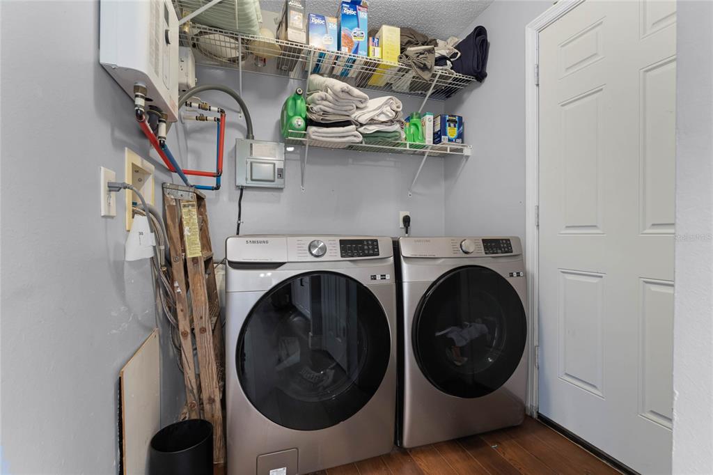 2935 Aein Road Orlando, FL 32817 - Photo 19 of 27 a utility room with dryer and washer