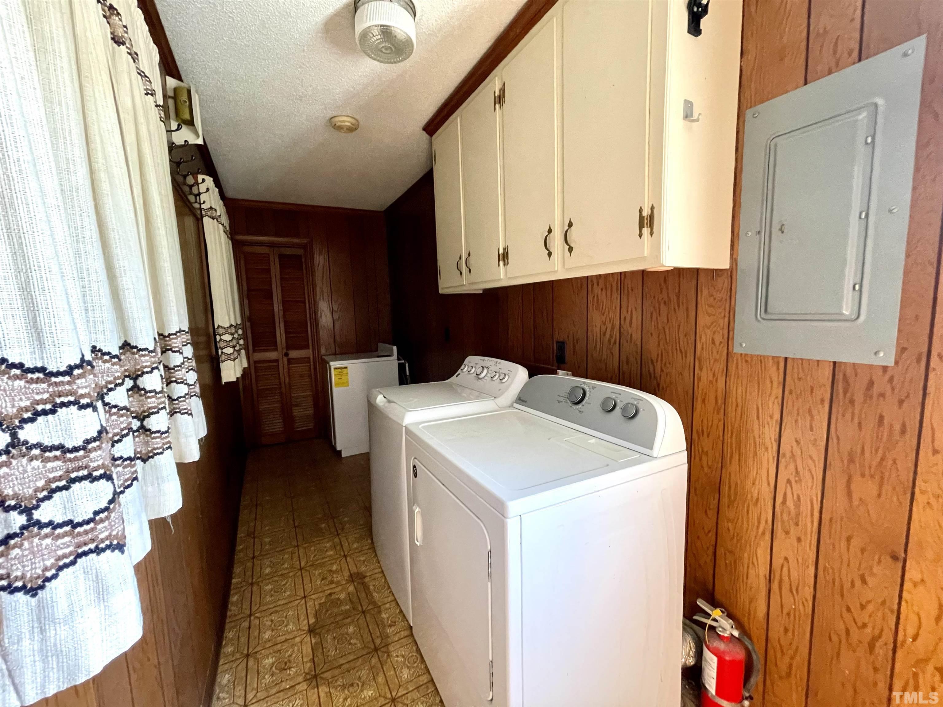 2995 Government Road Clayton, NC 27520 - Photo 8 of 15 a utility room with dryer and washer