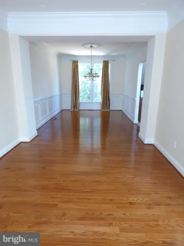 a view of livingroom with hardwood floor and window