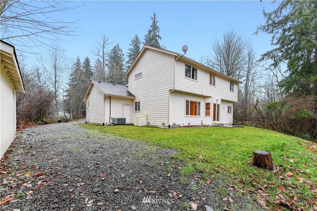 20126 Brown Road Monroe, WA 98272 - Photo 23 of 23 a view of a house with yard and a garden