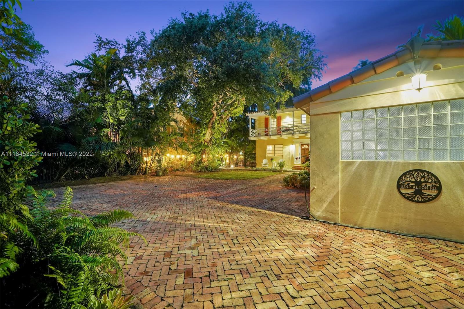 5842 Alton Road Miami Beach, FL 33140 - Photo 26 of 36 a view of a door of the house