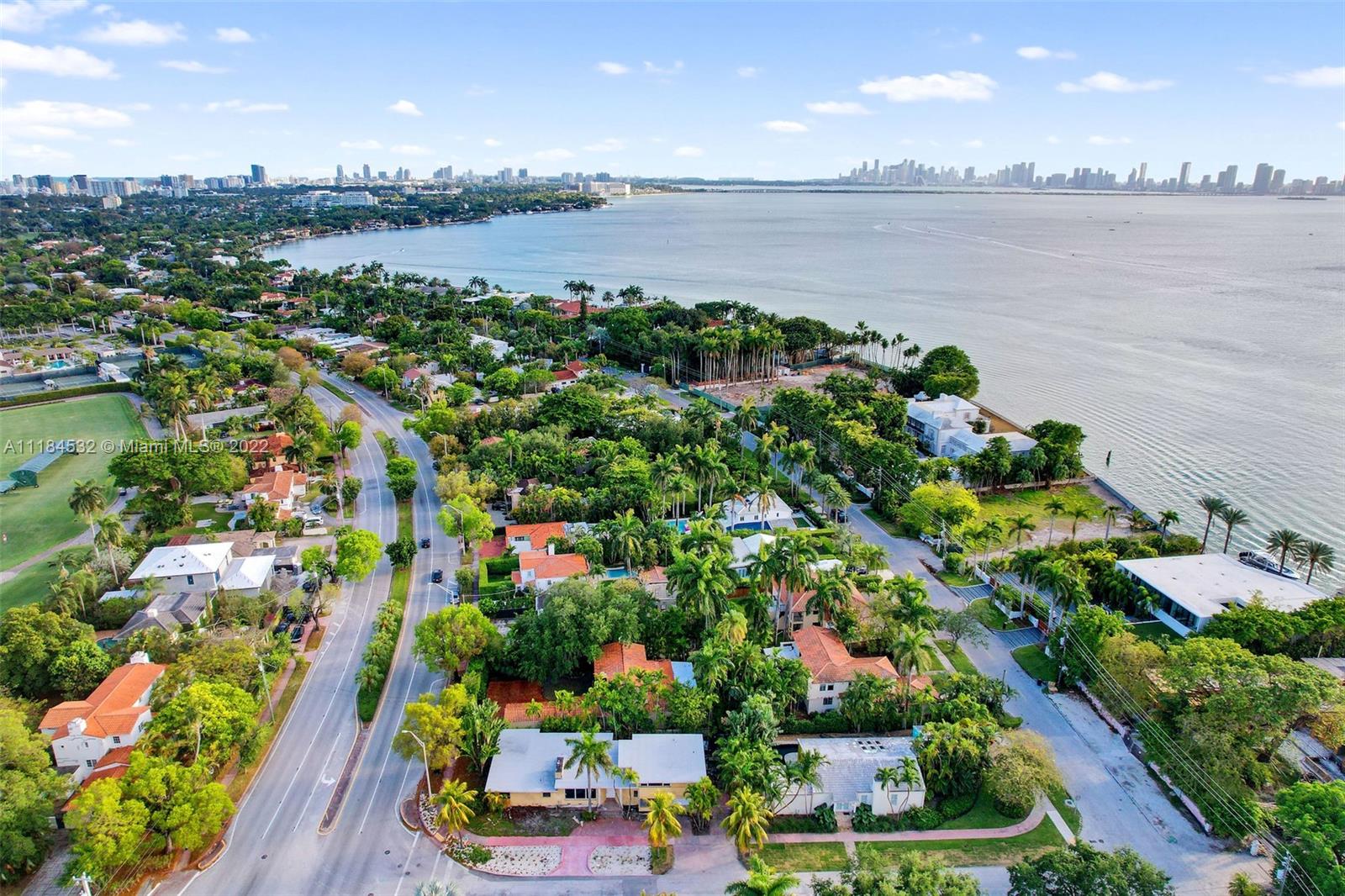 5842 Alton Road Miami Beach, FL 33140 - Photo 30 of 36 a view of lake and yard