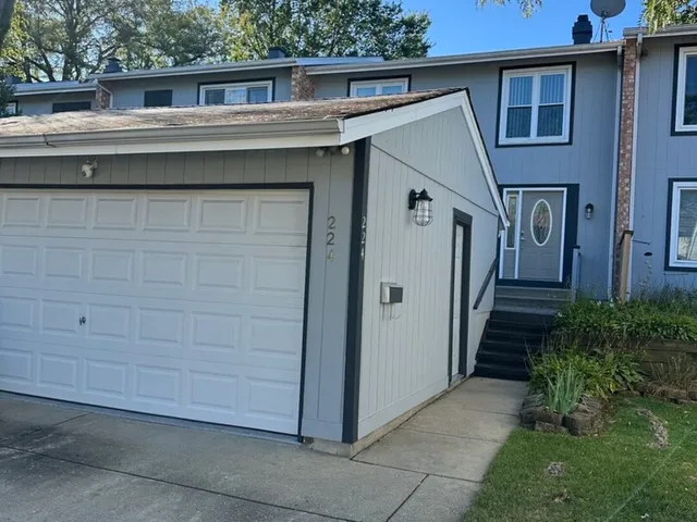 a view of a house with a yard