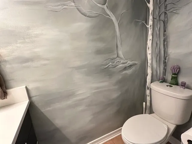 a white toilet sitting next to a shower curtain