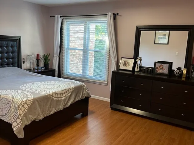 a room with furniture and wooden floor