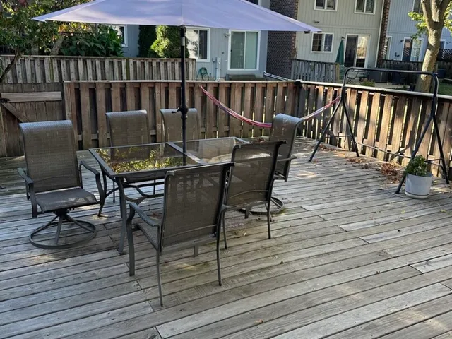 a view of a chairs and table on the wooden floor
