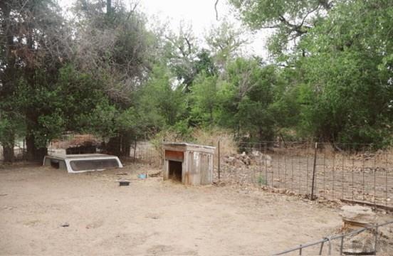 11229 County Rd JJ 5 Manzanola, CO 81058 - Photo 8 of 32 a backyard of a house with yard and outdoor seating