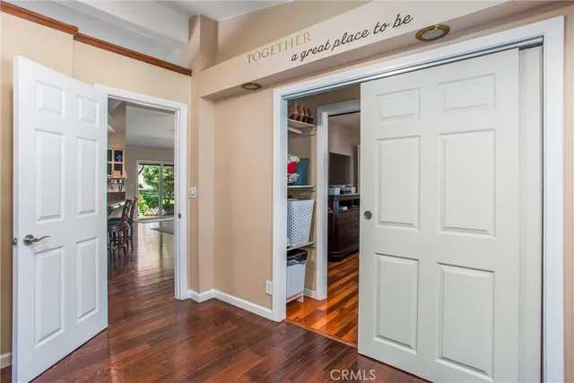 a workspace with furniture window and wooden floor