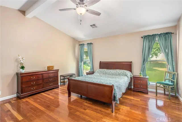 a bathroom with a double vanity sink mirror and