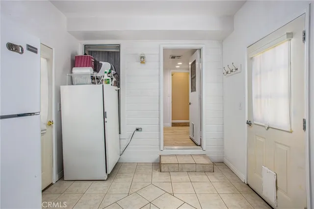 a view of a backyard with a sitting area