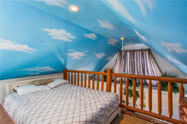 a view of a park with large trees