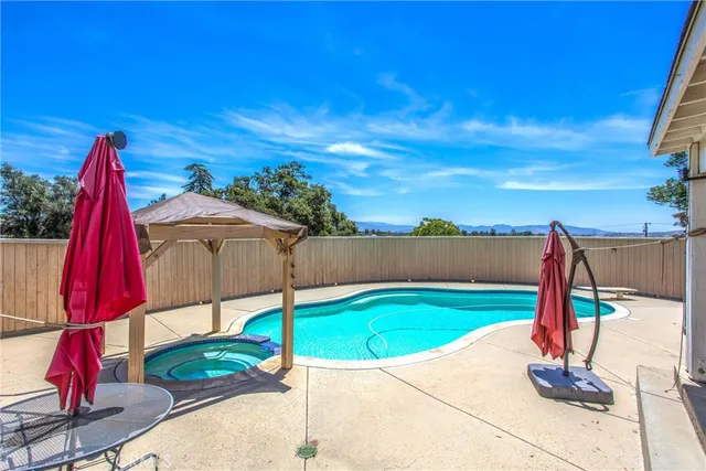 a view of a street with a building in the background