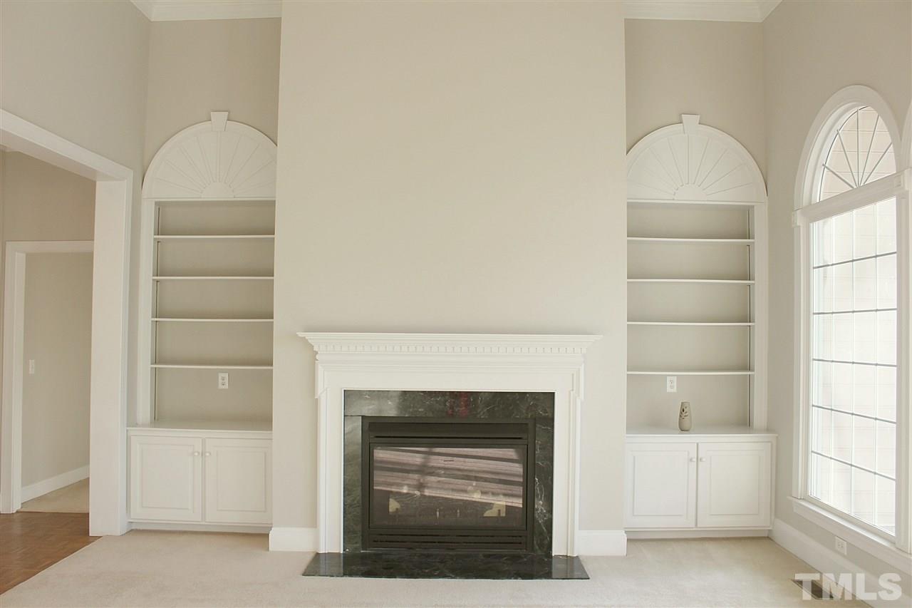 825 Rivers Edge Drive Graham, NC 27253 - Photo 6 of 25 Built-in bookcases, gas log fireplace