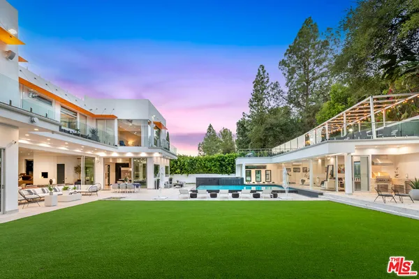 a view of a patio with swimming pool