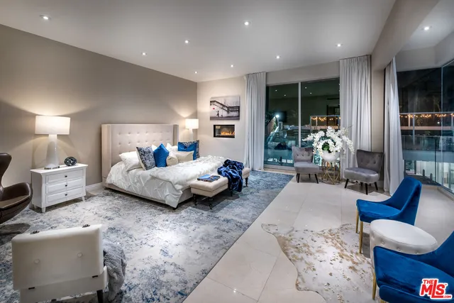 a large bathroom with a tub and shower