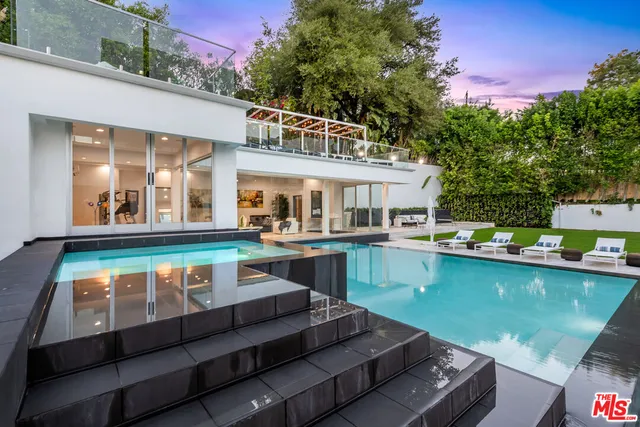 a view of room with window and cabinet