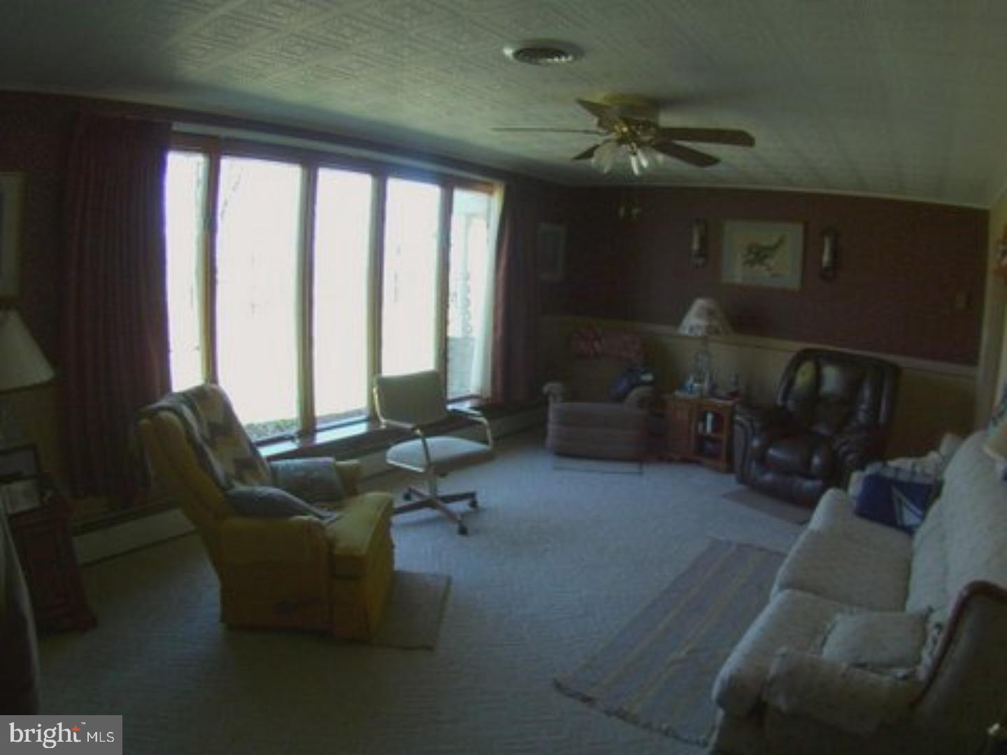 41 Cocalico Road Robesonia, PA 19551 - Photo 9 of 16 a living room with furniture and a fireplace