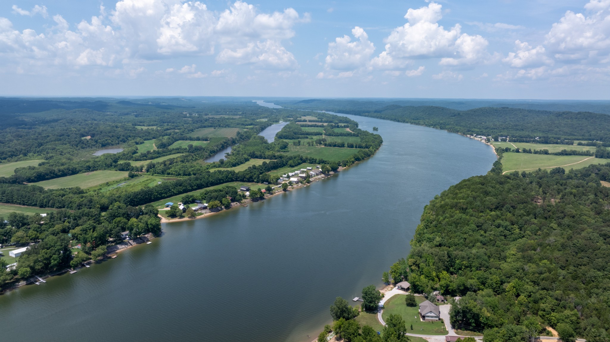 555 New Era Bluff Road Linden, TN 37096 - Photo 19 of 64 an aerial view of a houses with yard