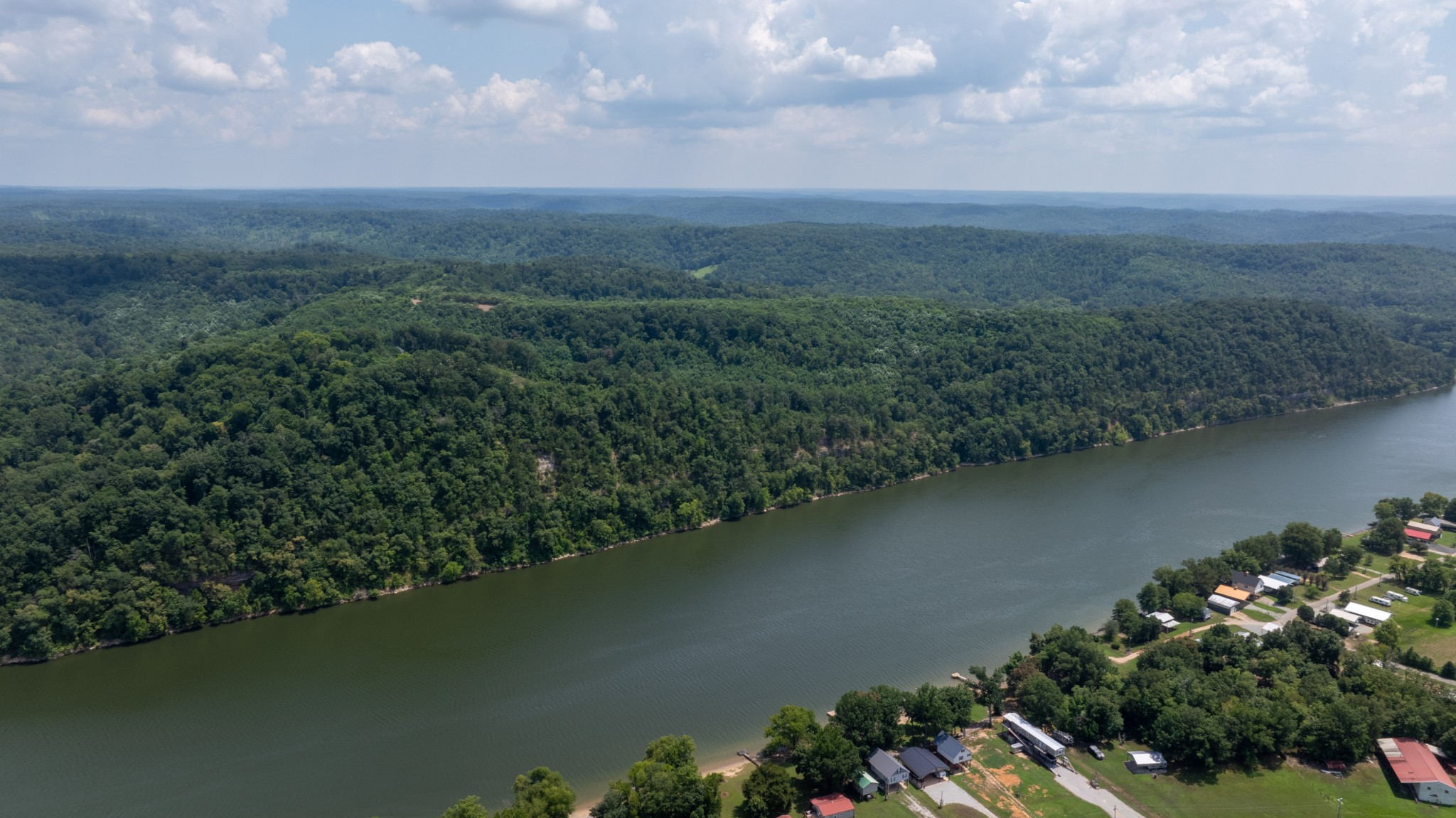 555 New Era Bluff Road Linden, TN 37096 - Photo 4 of 64 a view of a lake with a city