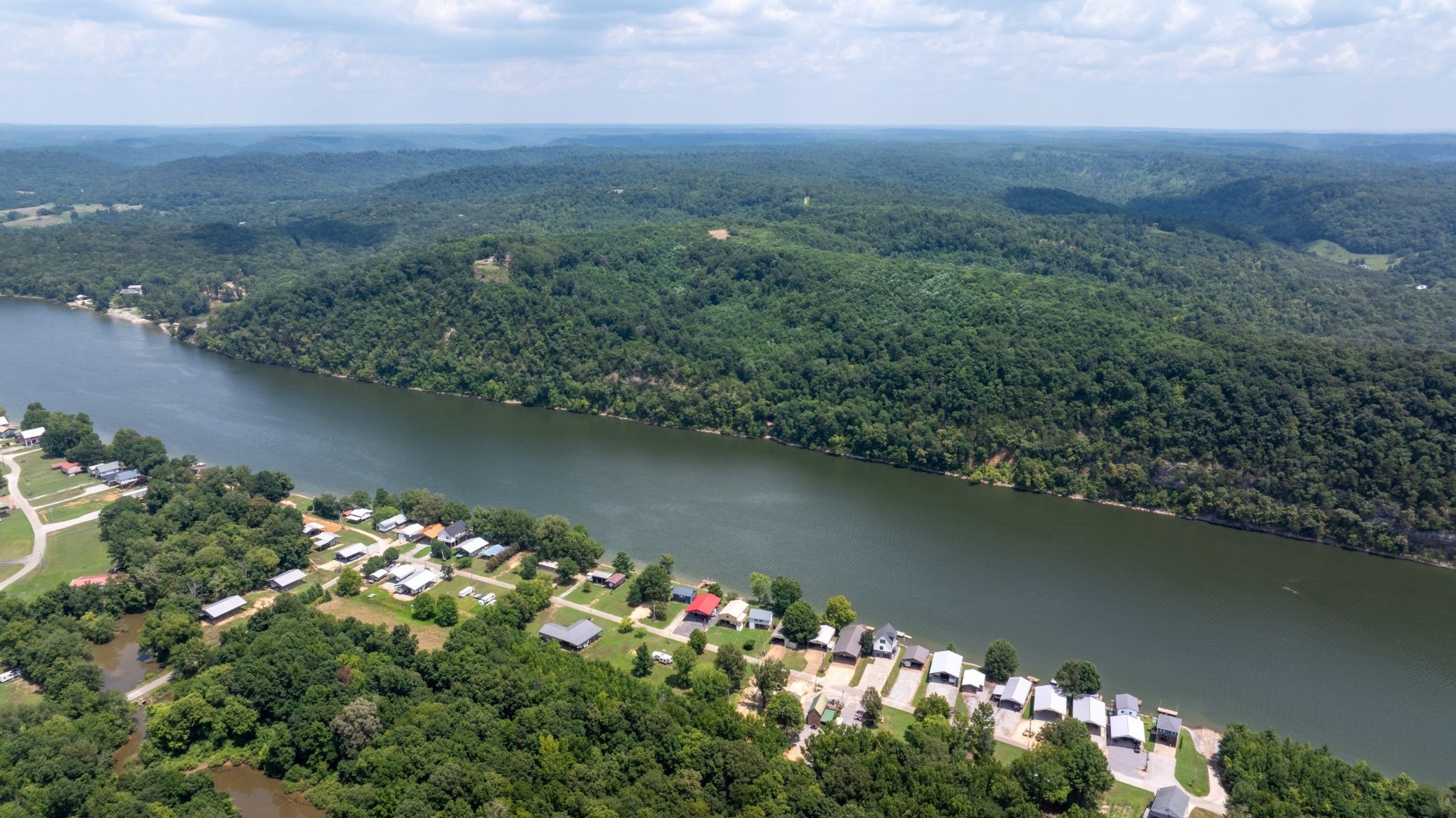 555 New Era Bluff Road Linden, TN 37096 - Photo 64 of 64 a view of a lake with a city
