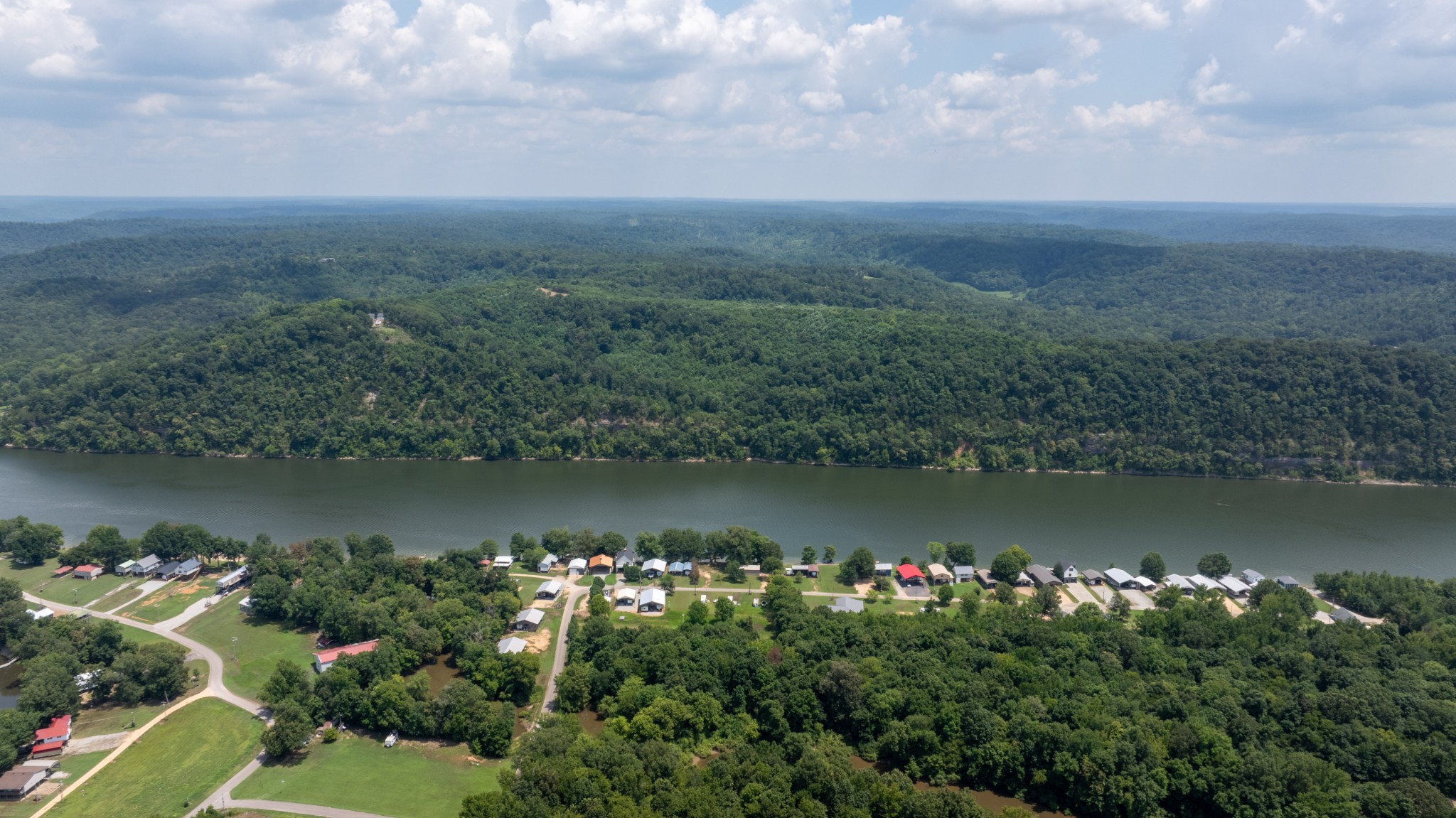 555 New Era Bluff Road Linden, TN 37096 - Photo 8 of 64 a view of a lake with a city