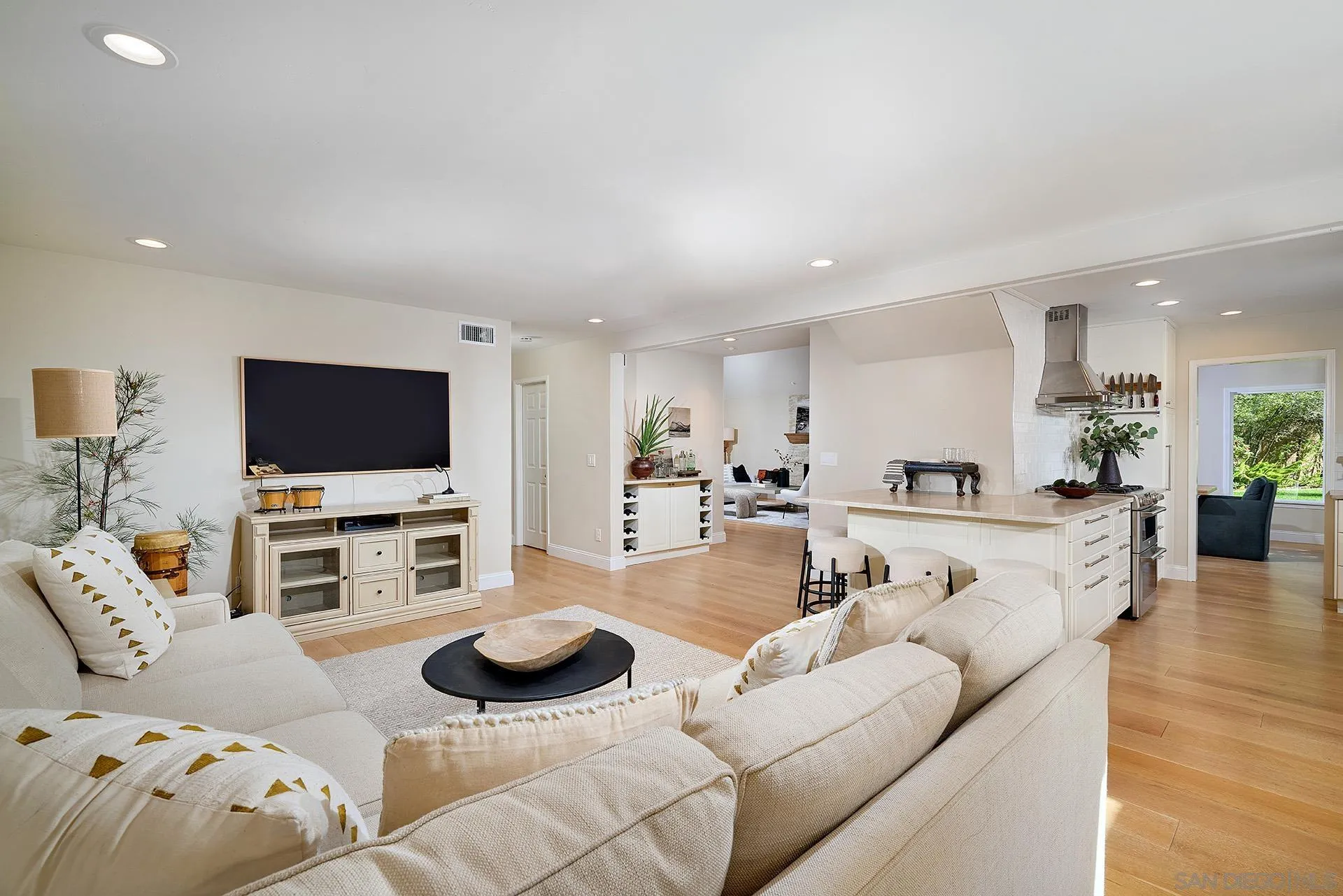 1229 Swallowtail Court Encinitas, CA 92024 - Photo 12 of 36 a living room with furniture and a flat screen tv